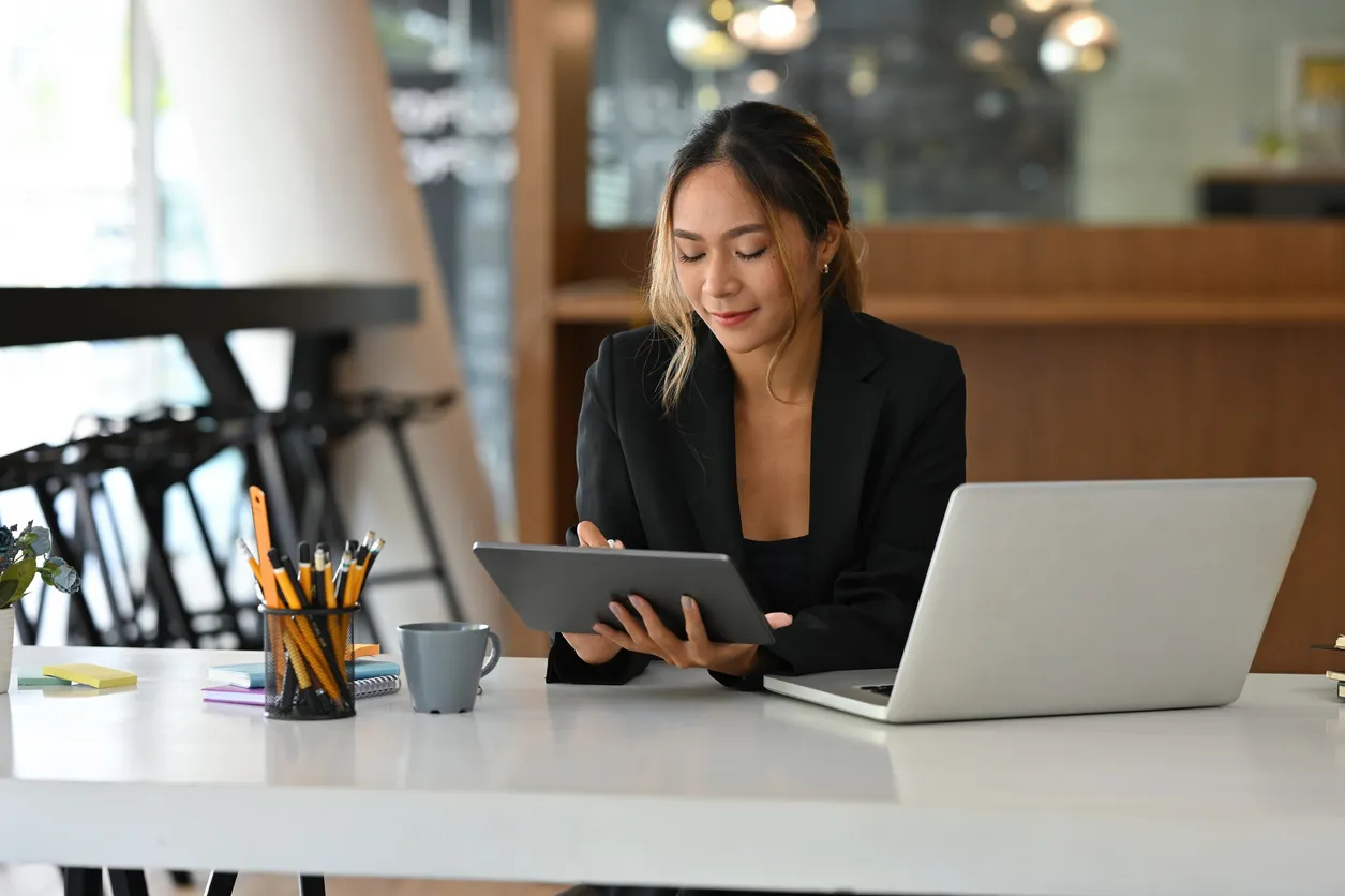 Young Woman Checking Credit Card Application